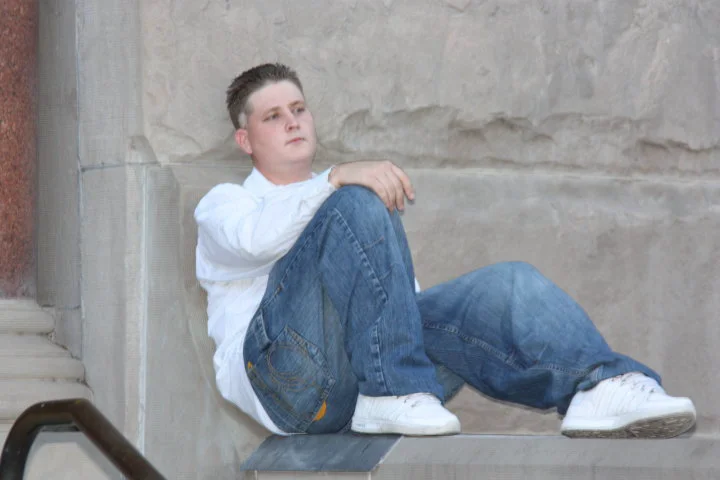 James Parr, portrait on stone steps